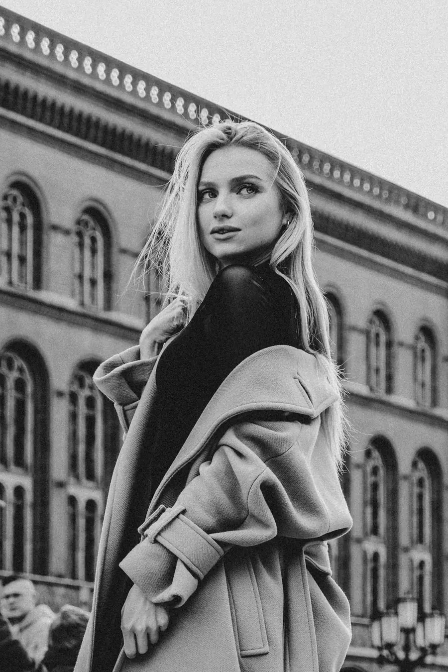 Model in a black wool coat